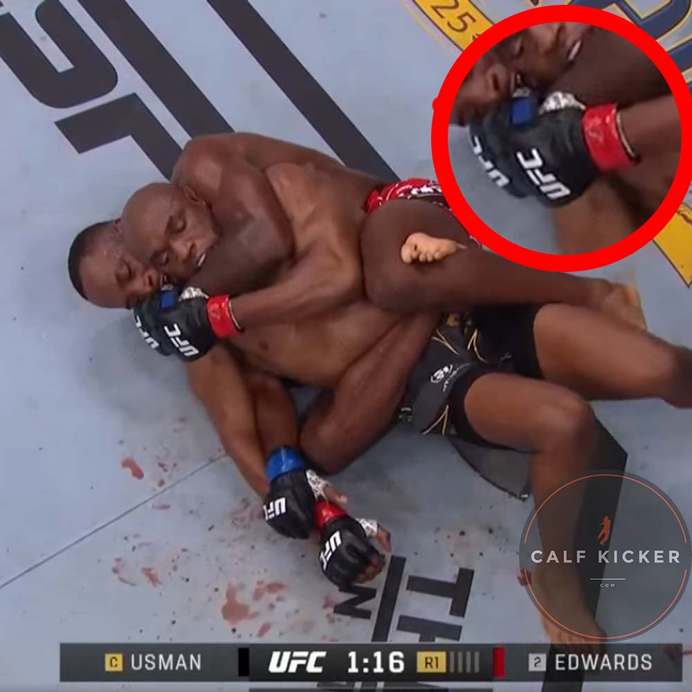 You can see Usman's taped thumb clearly going under the wraps of Edwards' glove