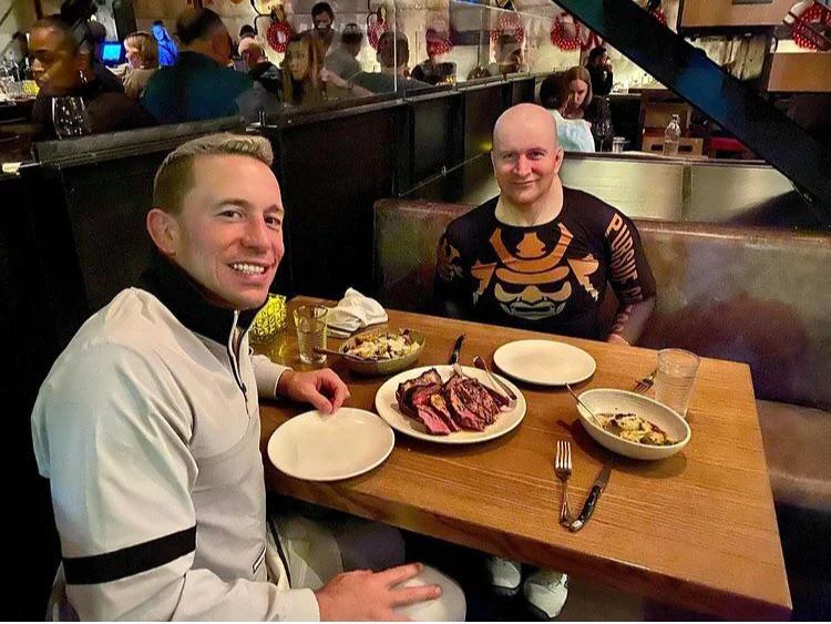 George is out to dinner with John Danaher and of course he is wearing a rash guard