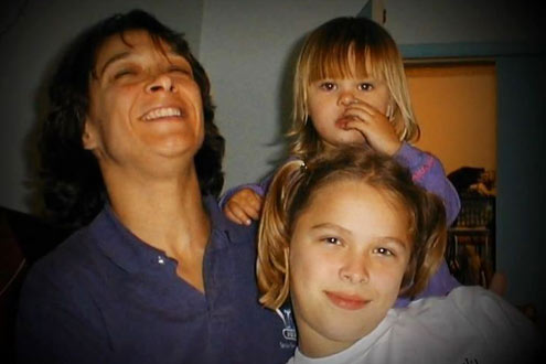 Ronda Rousey with mom and sister