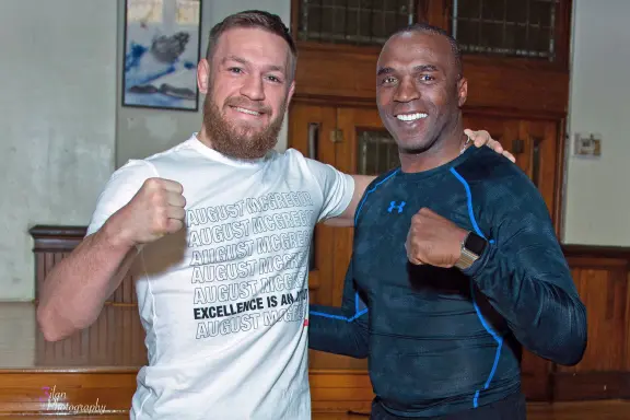  Conor McGregor (L) and pastor Clive Neil at Bedford Central Church